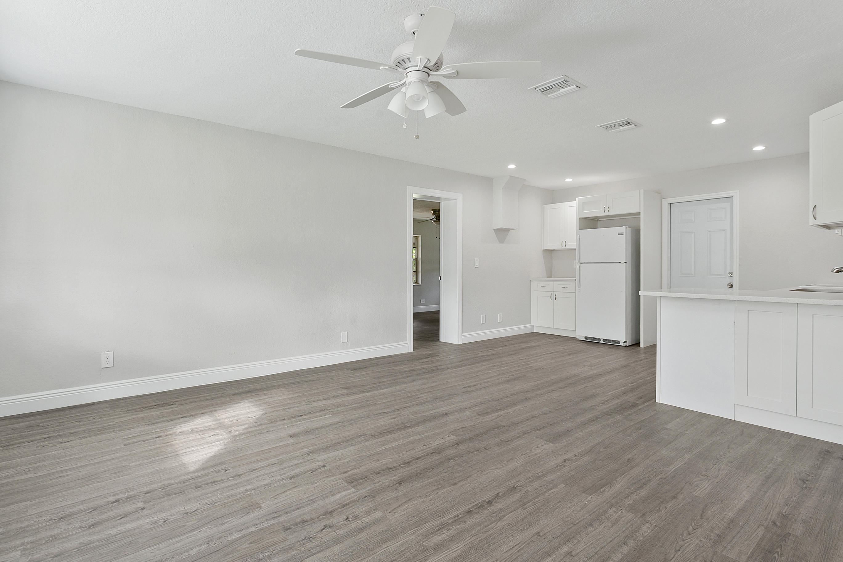 421 Pine Road West Palm Beach, FL 33409 - Photo 3 of 19 Living Room & Kitchen