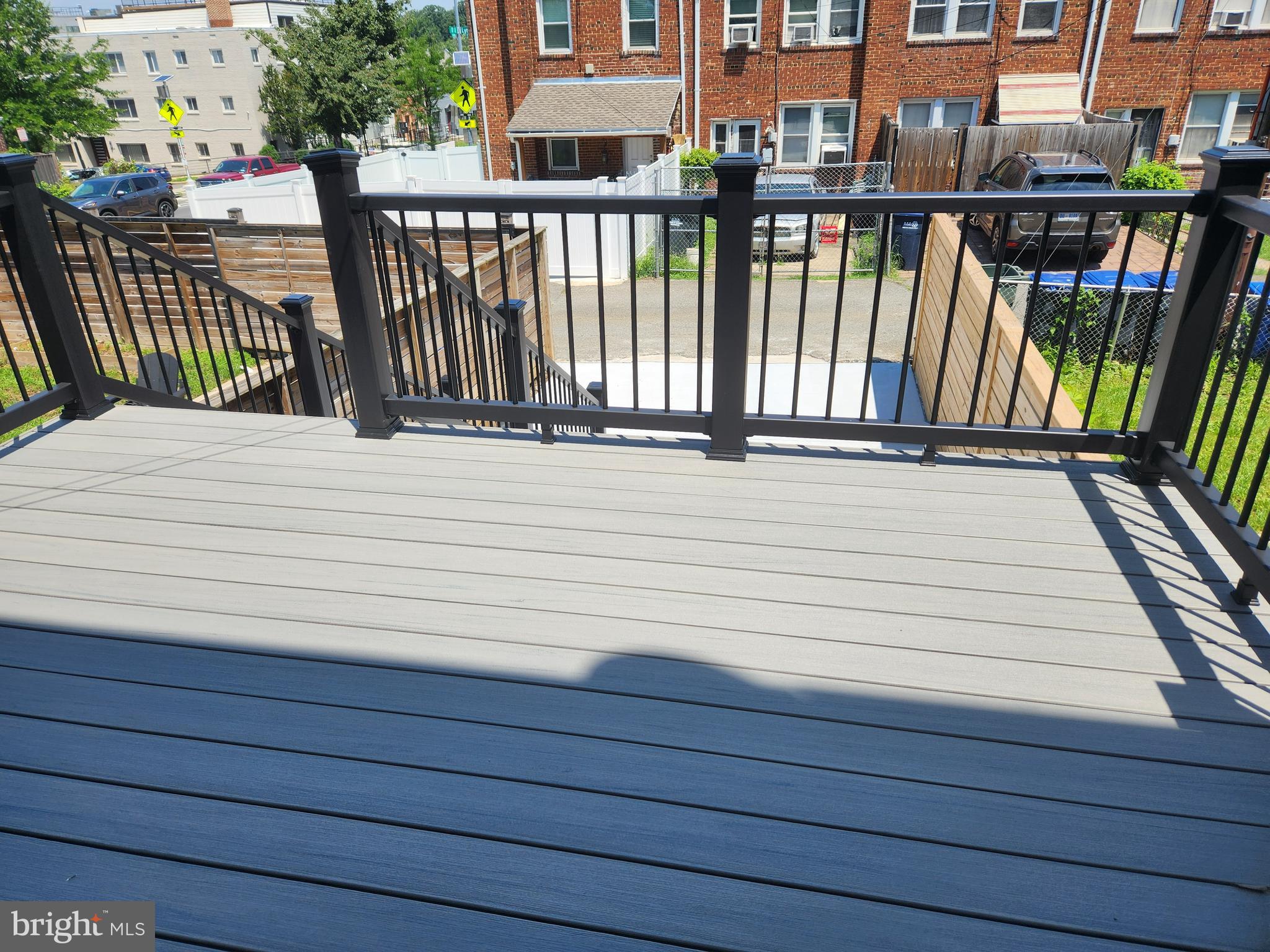 1702 Lang Place Northeast Washington, DC 20002 - Photo 28 of 36 a view of a balcony with wooden floor