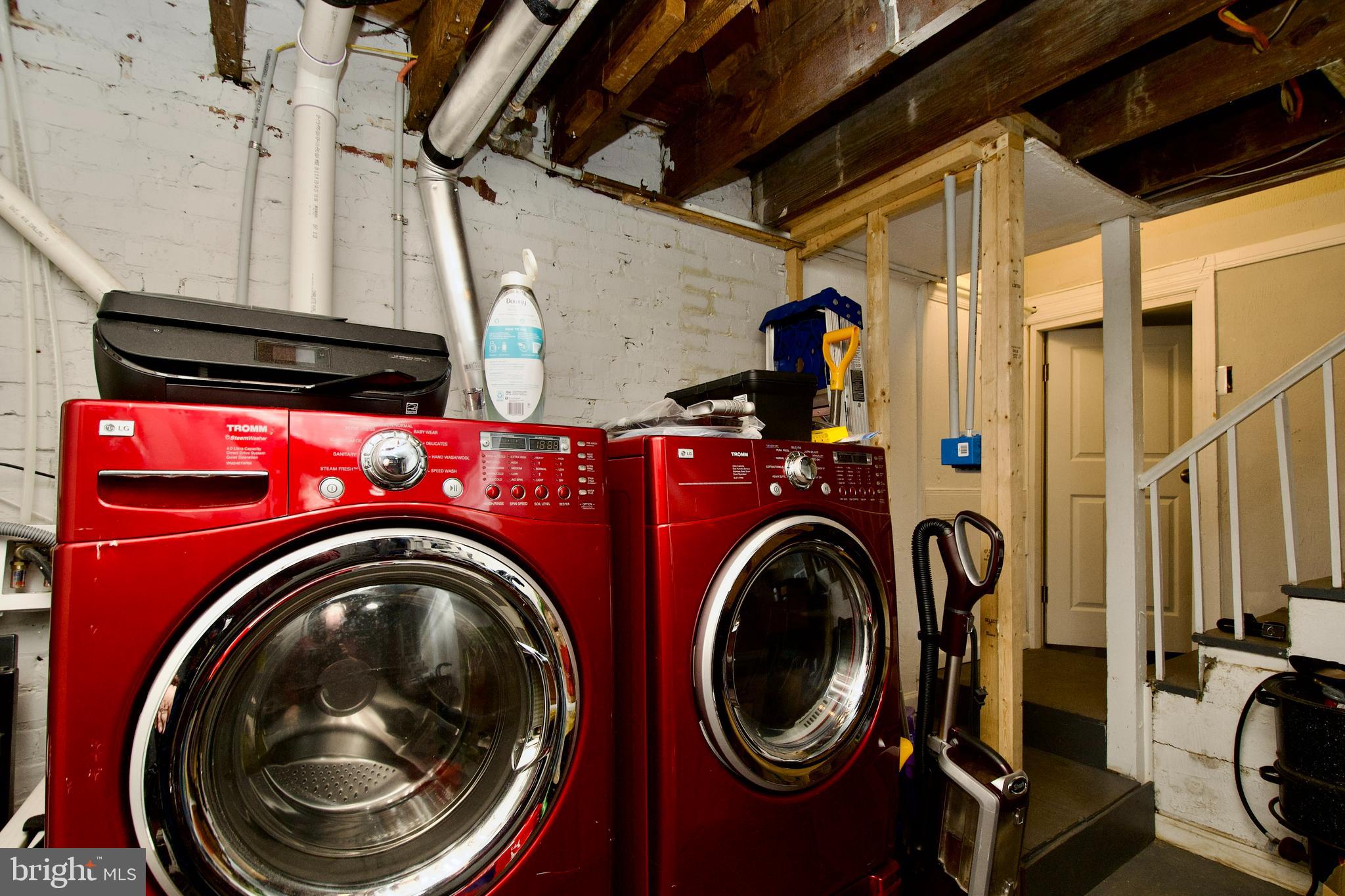 1702 Lang Place Northeast Washington, DC 20002 - Photo 34 of 36 a utility room with dryer and washer