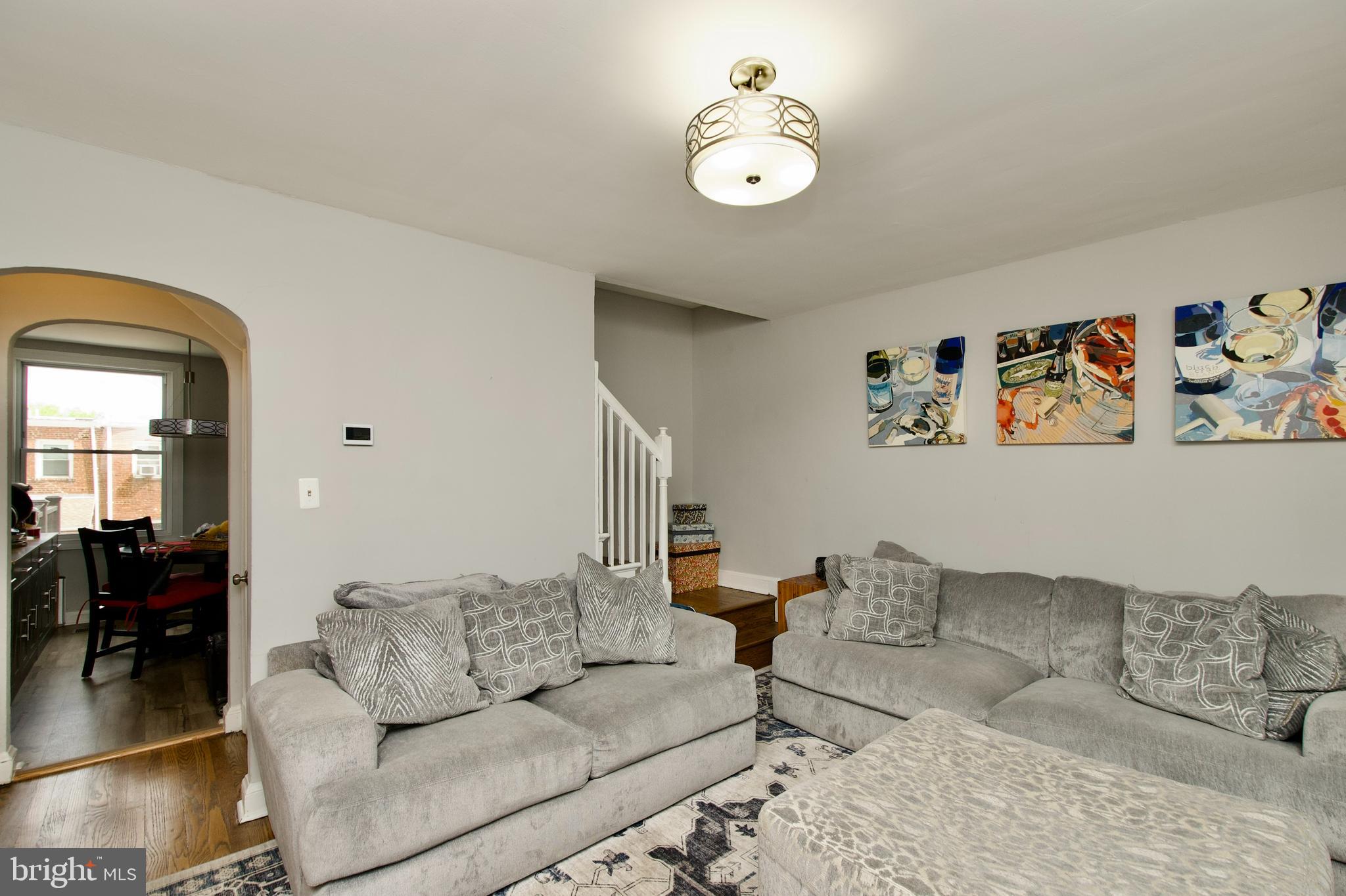 1702 Lang Place Northeast Washington, DC 20002 - Photo 6 of 36 a living room with furniture and couch