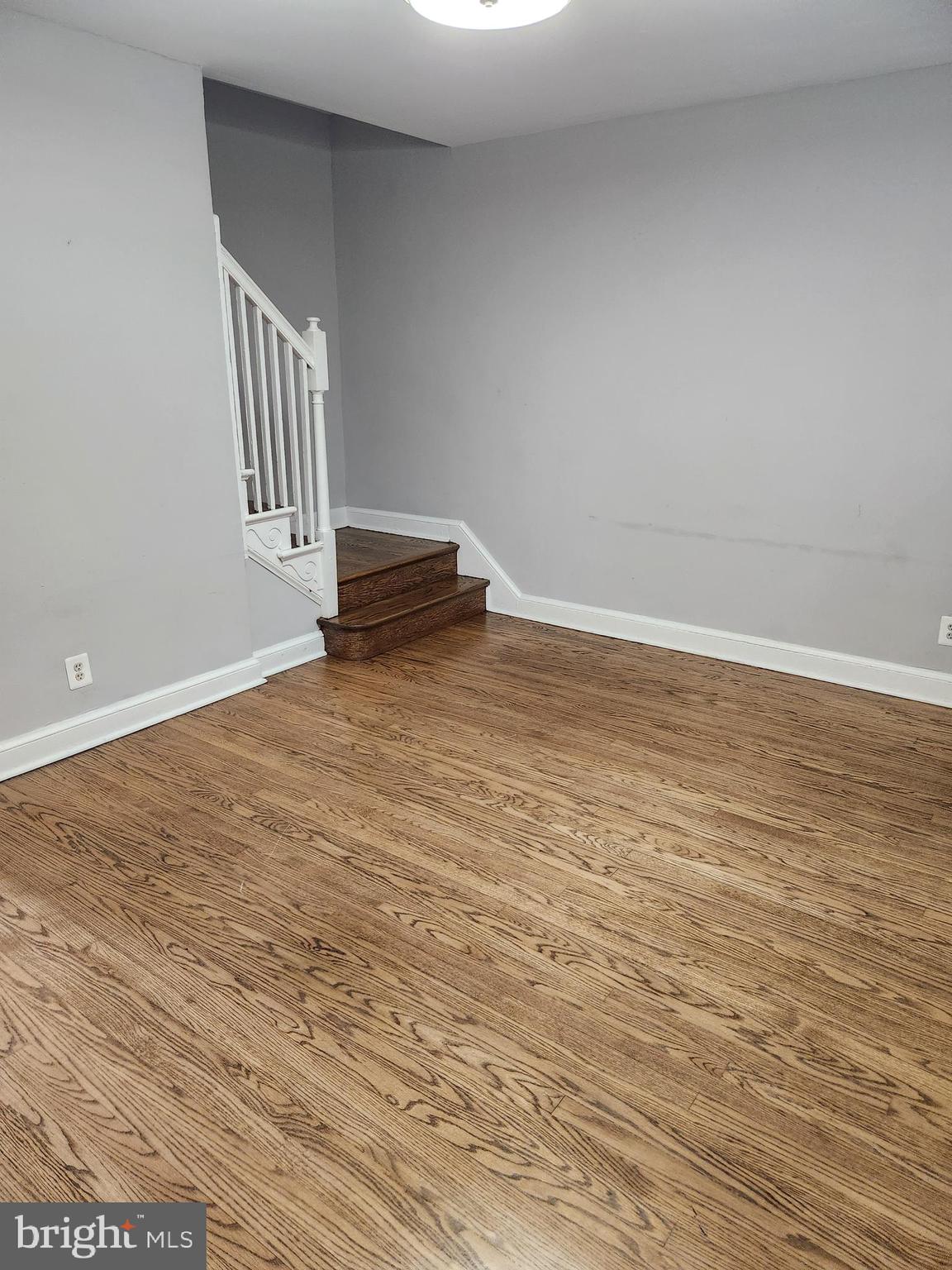 1702 Lang Place Northeast Washington, DC 20002 - Photo 6 of 36 a view of an empty room with stairs and ventilation