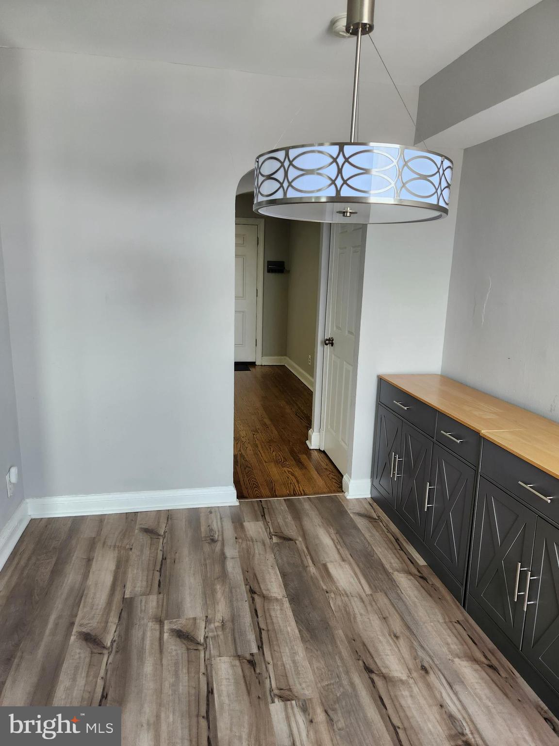 1702 Lang Place Northeast Washington, DC 20002 - Photo 9 of 36 a view of a hallway with wooden floor