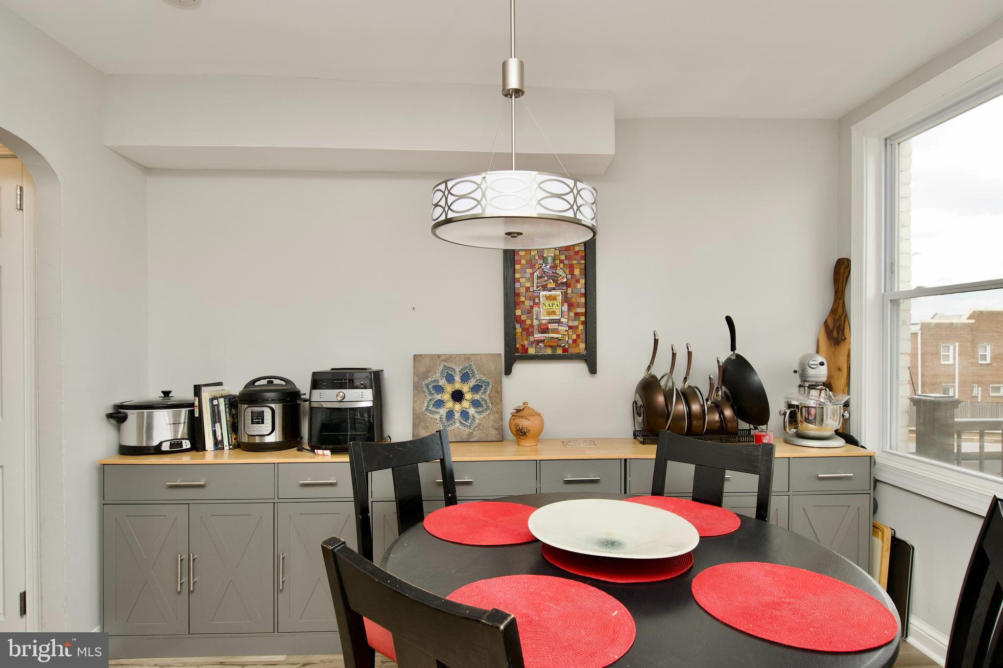 1702 Lang Place Northeast Washington, DC 20002 - Photo 10 of 36 a dining room with furniture and window