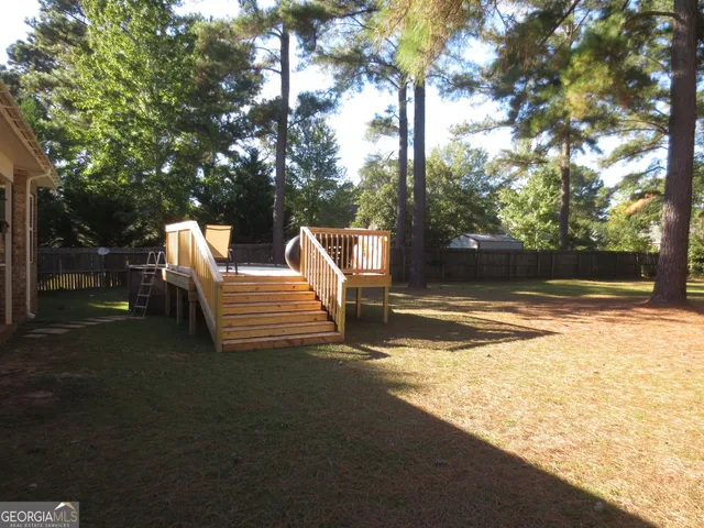 a view of a lake with a tree