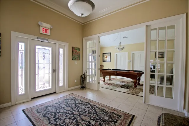 a bedroom with bed and a window