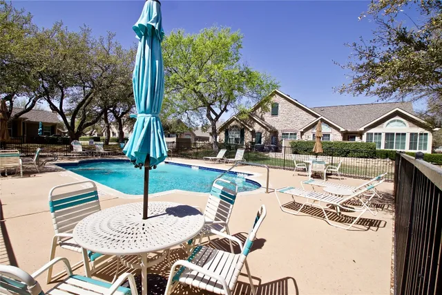 a outdoor space with lots of palm trees