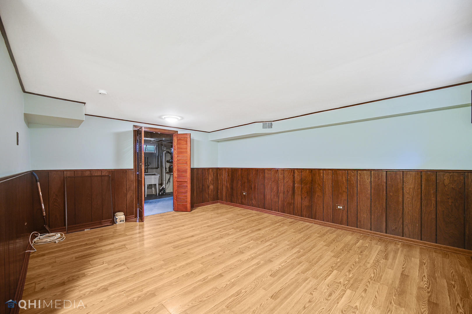 2128 West 111th Street, Unit G Chicago, IL 60643 - Photo 15 of 20 a view of room with wooden floor
