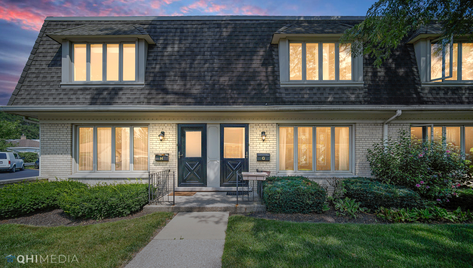 2128 West 111th Street, Unit G Chicago, IL 60643 - Photo 3 of 20 a front view of a house with a yard