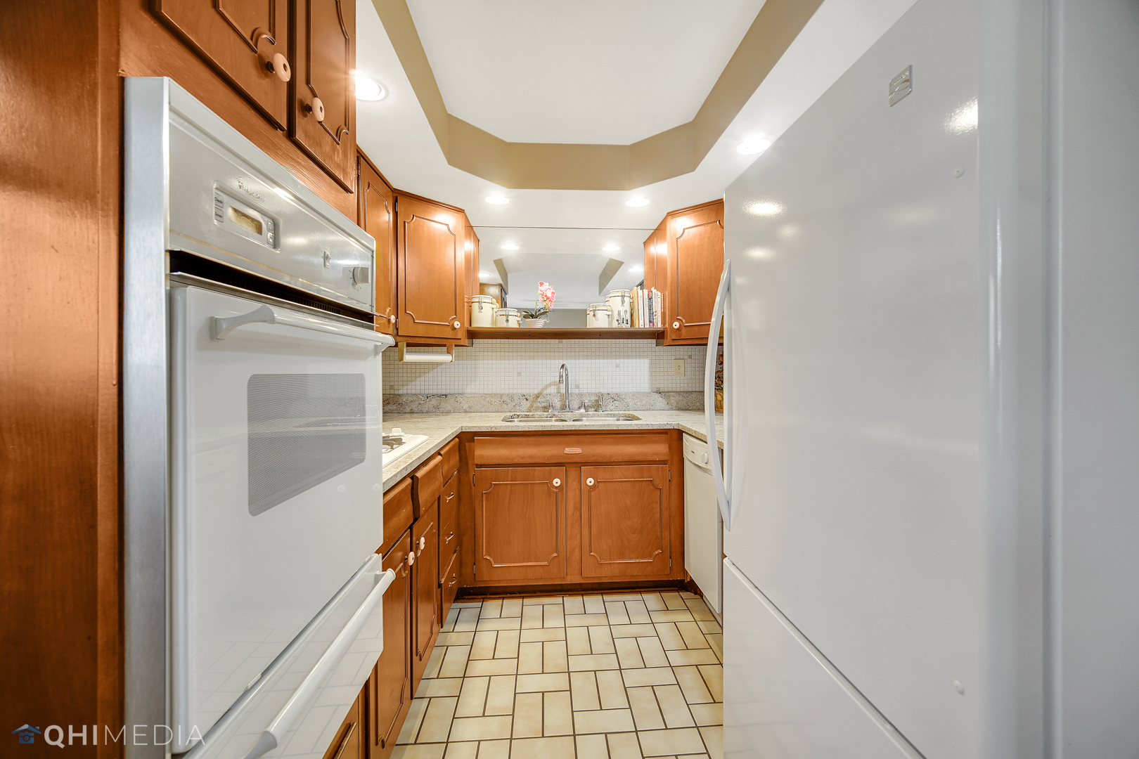 2128 West 111th Street, Unit G Chicago, IL 60643 - Photo 9 of 20 a bathroom with a sink and a mirror