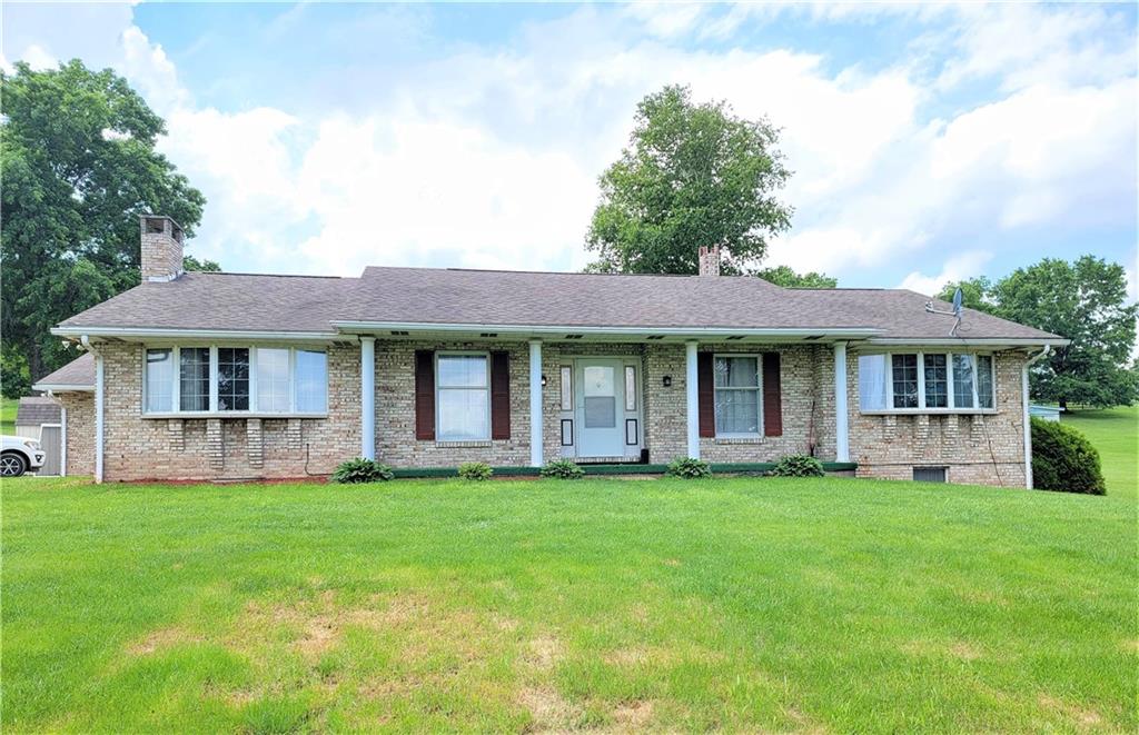 130 Pflugh Road Butler, PA 16001 - Photo 1 of 25 a front view of a house with a yard and porch