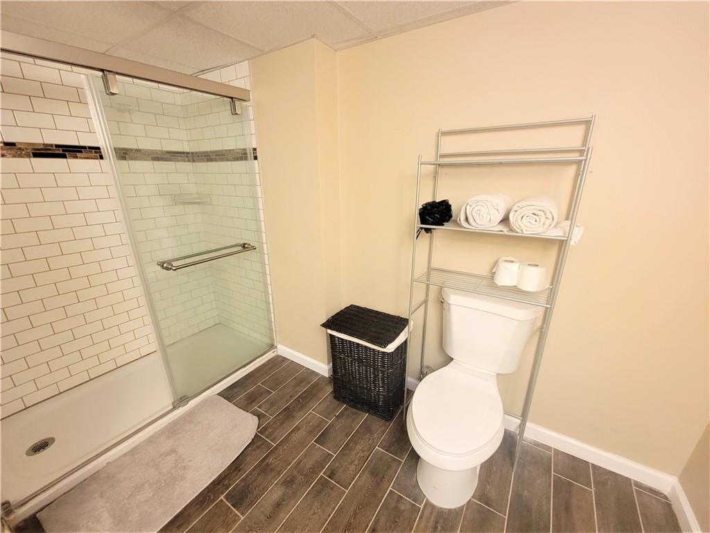 130 Pflugh Road Butler, PA 16001 - Photo 15 of 25 a bathroom with a toilet and a shower
