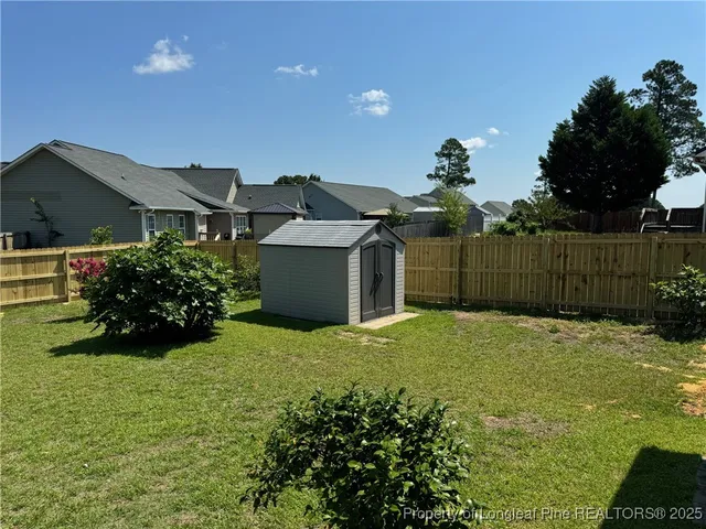 a view of outdoor space and yard
