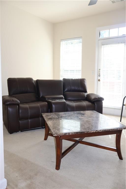 2278 Dillard Crossing Tucker, GA 30084 - Photo 12 of 22 a living room with furniture and a window
