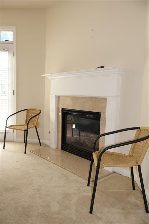 2278 Dillard Crossing Tucker, GA 30084 - Photo 13 of 22 a living room with a chair and a fireplace