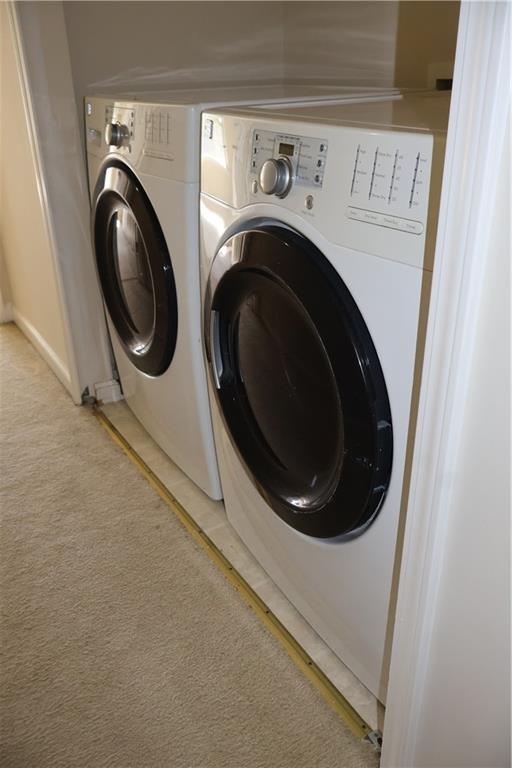 2278 Dillard Crossing Tucker, GA 30084 - Photo 14 of 22 a utility room with dryer and washer