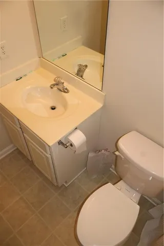 a bathroom with a sink and toilet