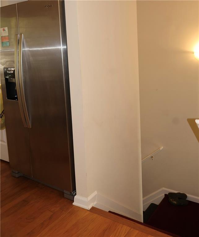 2278 Dillard Crossing Tucker, GA 30084 - Photo 19 of 22 an empty room with wooden floor