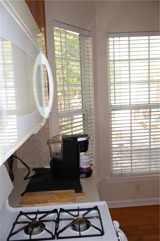2278 Dillard Crossing Tucker, GA 30084 - Photo 3 of 22 a view of a workspace with furniture and a window