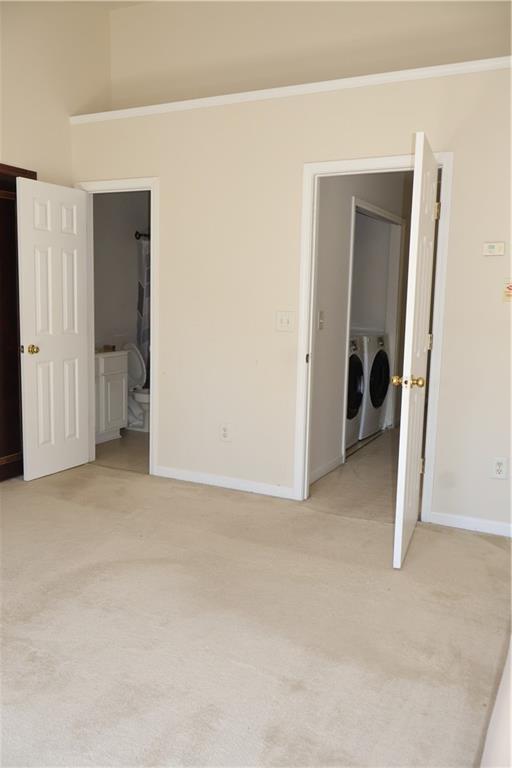 2278 Dillard Crossing Tucker, GA 30084 - Photo 4 of 22 an empty room with closet and mirrors