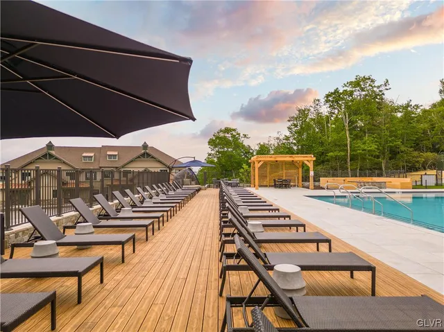 a view of a lake with houses in the back