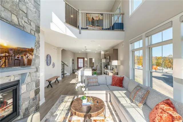a view of a living room and dining room