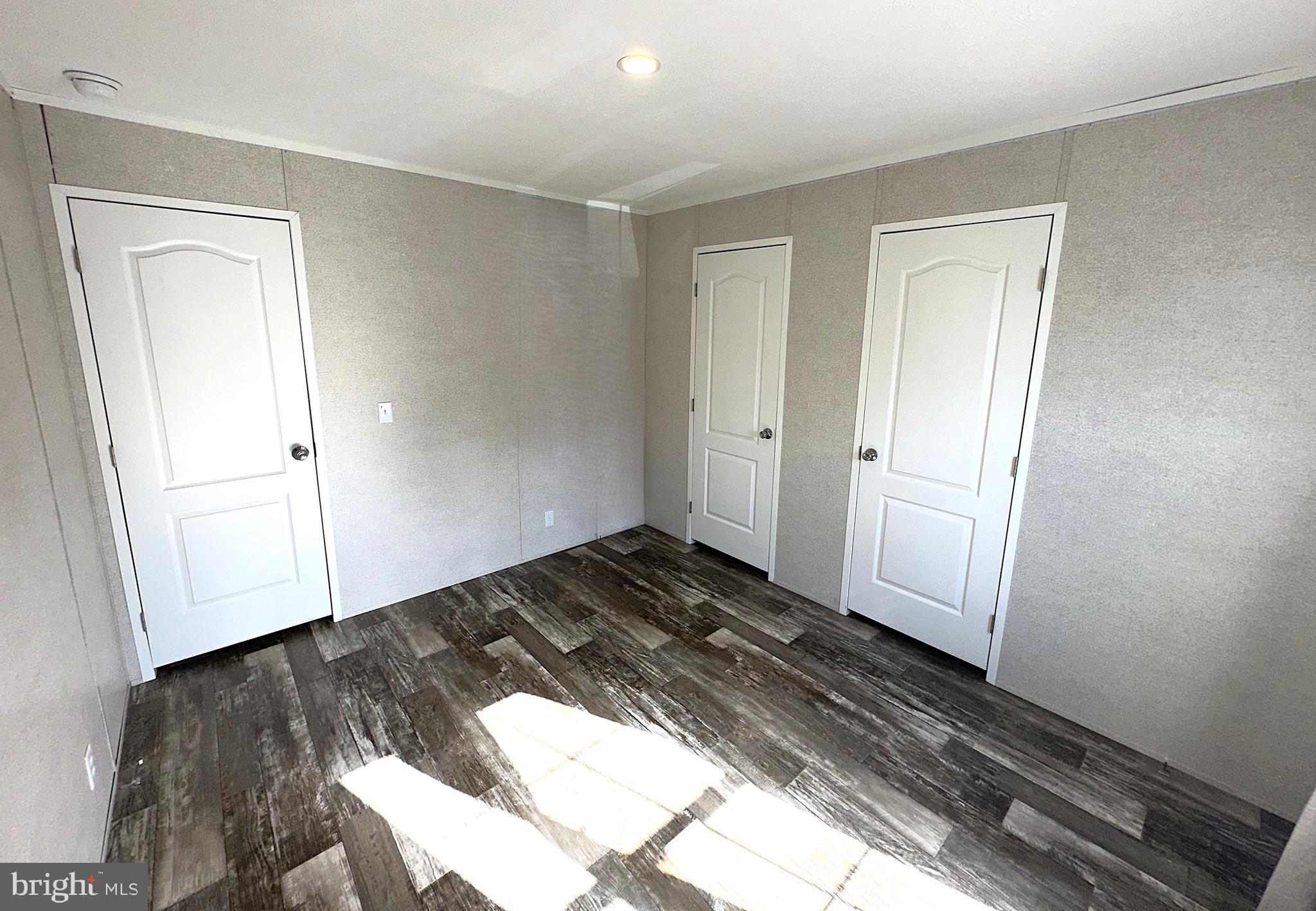 490 North Patuxent Road, Unit 21 Odenton, MD 21113 - Photo 17 of 22 a view of a room with wooden floor