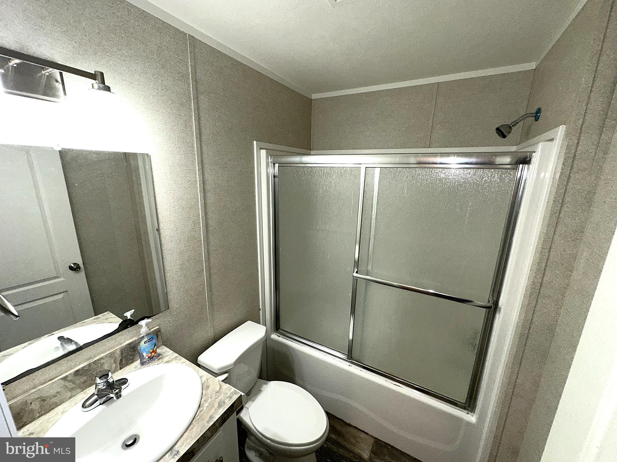 490 North Patuxent Road, Unit 21 Odenton, MD 21113 - Photo 19 of 22 a bathroom with a sink toilet and shower