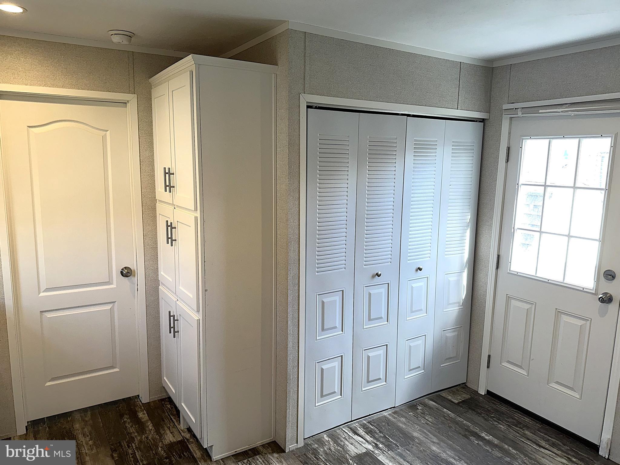 490 North Patuxent Road, Unit 21 Odenton, MD 21113 - Photo 7 of 22 a view of a bathroom with a sink and a mirror