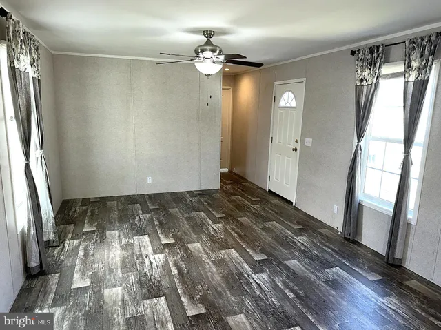 a view of entryway with wooden floor