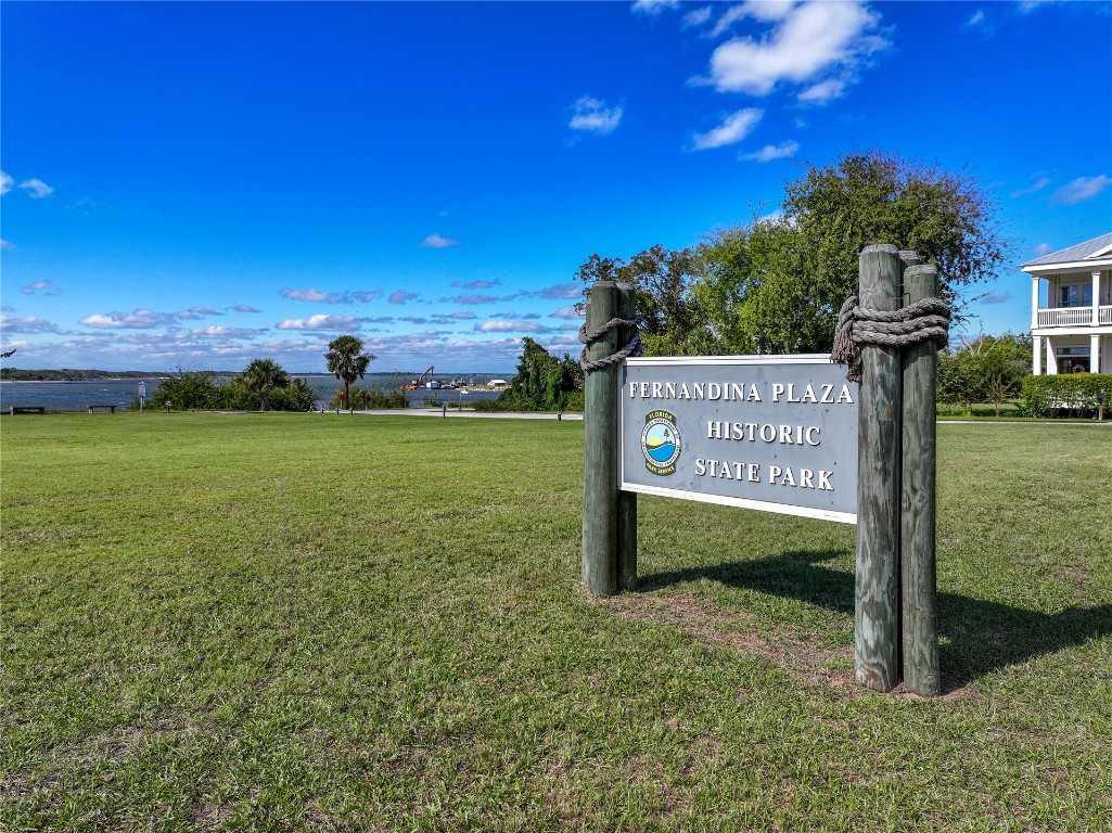903 Someruelus Road Fernandina Beach, FL 32034 - Photo 5 of 24 a view of a street with sign board
