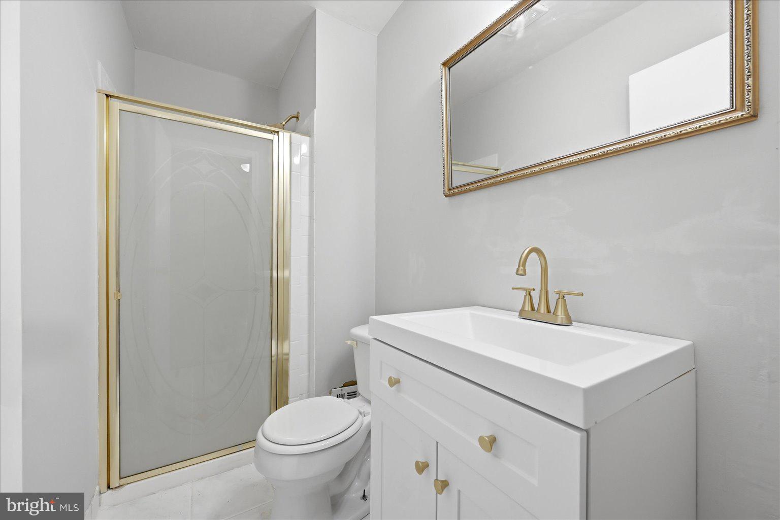 9110 Meadow Heights Road Randallstown, MD 21133 - Photo 24 of 39 Sleek bathroom with modern elegance.