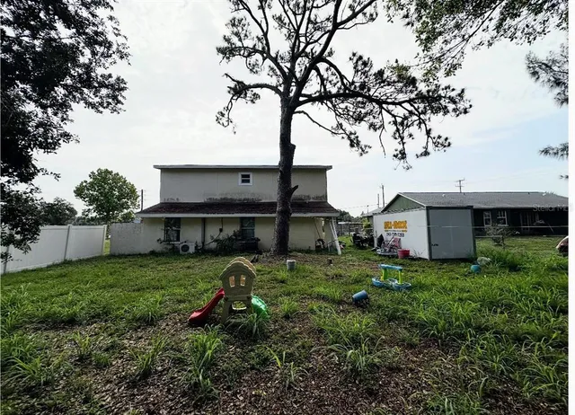 a view of a house with garden