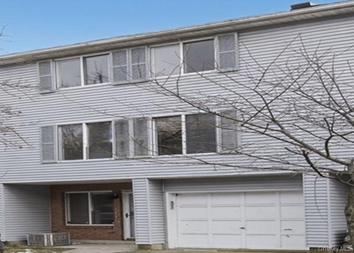 623 Ilyssa Way Staten Island, NY 10312 - Photo 1 of 1 View of front facade with a garage