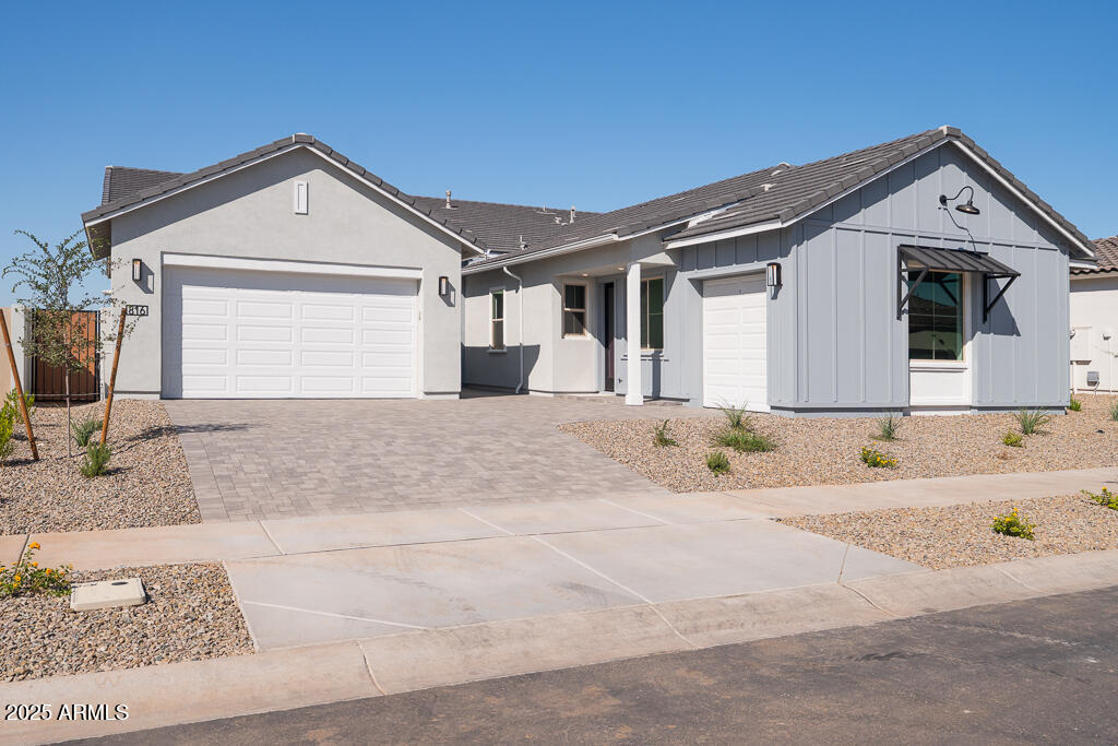 a front view of a house with a outdoor space