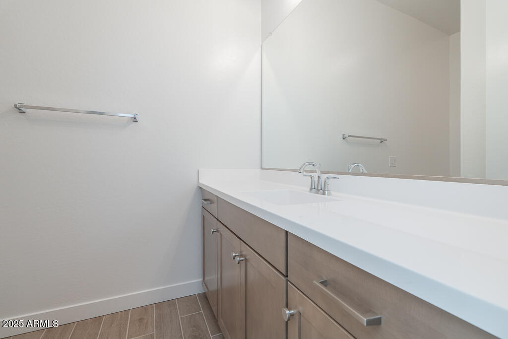 816 Golden Ore Pass Apache Junction, AZ 85120 - Photo 17 of 23 a bathroom with a sink and vanity