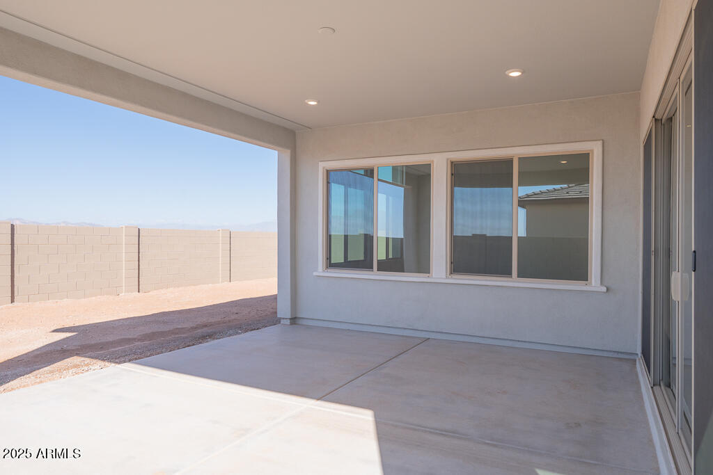 816 Golden Ore Pass Apache Junction, AZ 85120 - Photo 21 of 23 an empty room with windows