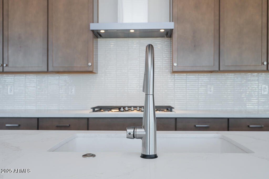 816 Golden Ore Pass Apache Junction, AZ 85120 - Photo 3 of 23 a kitchen with a sink and cabinets