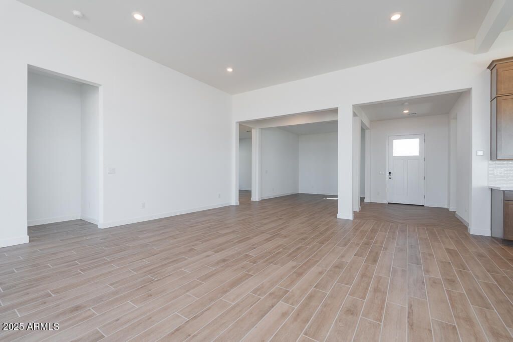 816 Golden Ore Pass Apache Junction, AZ 85120 - Photo 5 of 23 a view of empty room with wooden floor