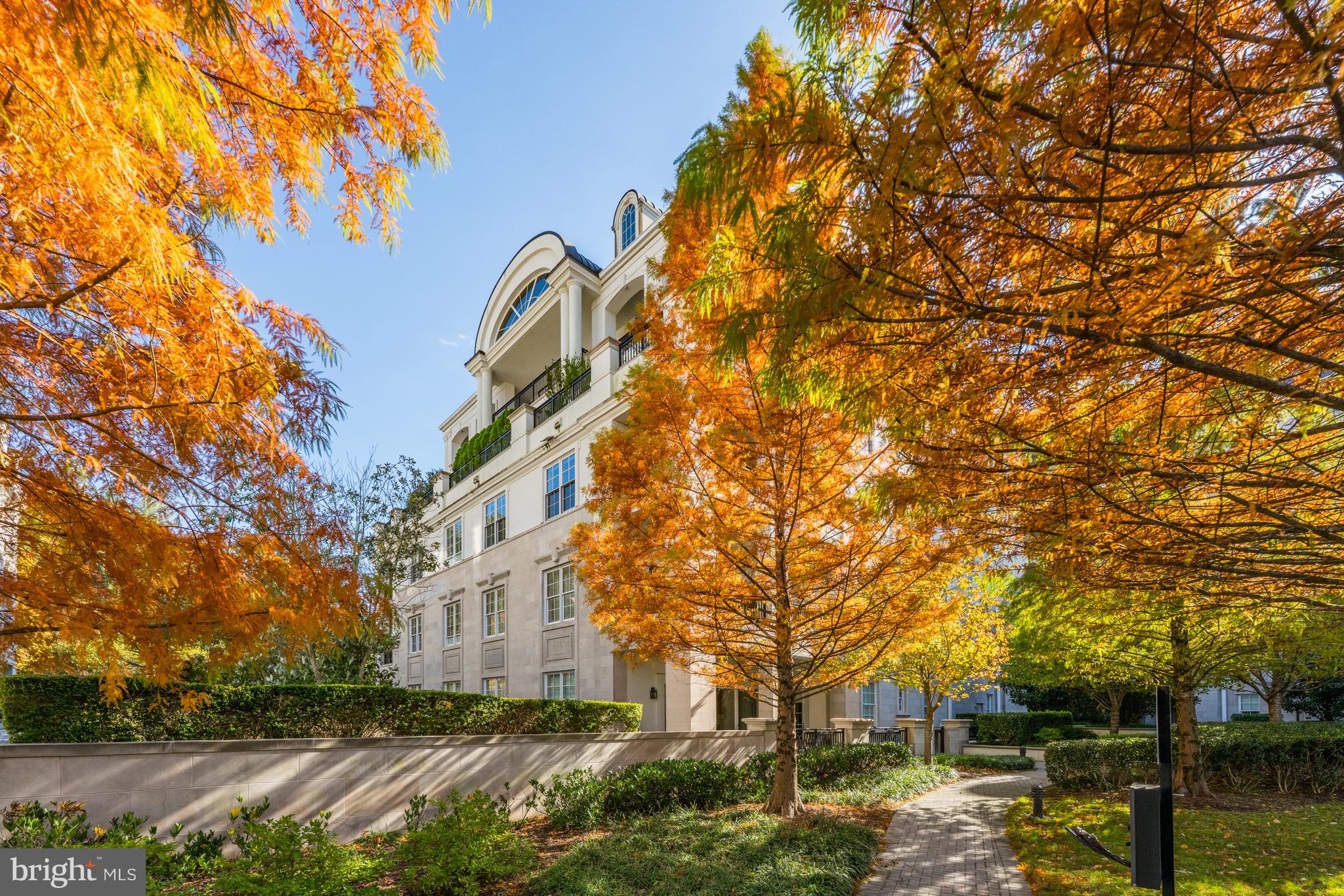 a view of a building with a yard