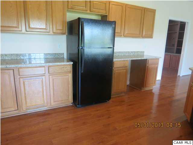 933 Mt Olivet Road Dyke, VA 22935 - Photo 18 of 28 a kitchen with stainless steel appliances granite countertop a refrigerator and cabinets