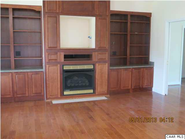 933 Mt Olivet Road Dyke, VA 22935 - Photo 25 of 28 a view of an empty room with a fireplace and a window