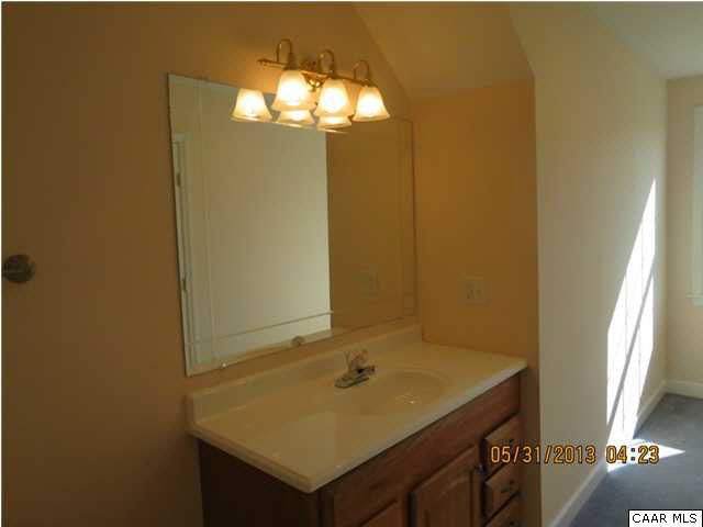933 Mt Olivet Road Dyke, VA 22935 - Photo 5 of 28 a bathroom with a sink and a mirror