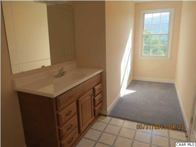 933 Mt Olivet Road Dyke, VA 22935 - Photo 6 of 28 a kitchen with a sink cabinets and window