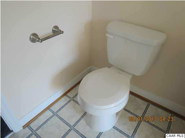 933 Mt Olivet Road Dyke, VA 22935 - Photo 7 of 28 a white toilet sitting next to a shower
