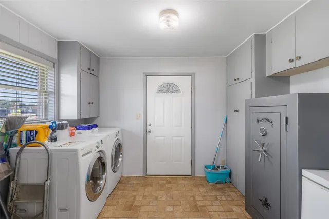 a view of utility room with washer and dryer
