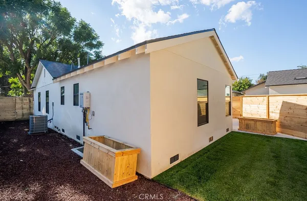 a backyard of a house with seating space