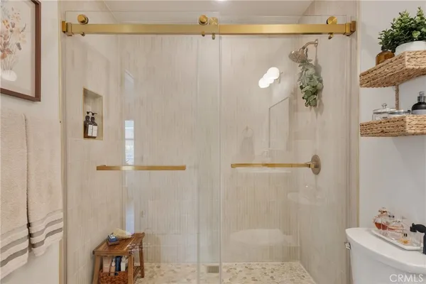 a bathroom with a shower curtain and a sink