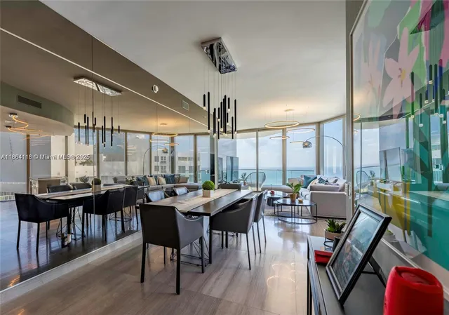 a dining hall with furniture window and wooden floor