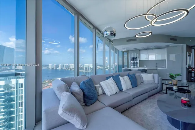 a view of a livingroom with furniture and windows