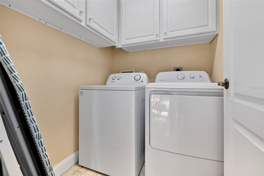 1864 Orange Tree Drive Edgewater, FL 32141 - Photo 18 of 38 a utility room with dryer and washer